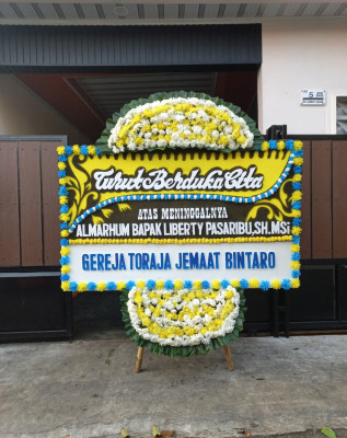 Papan Bunga Duka di Martimbang